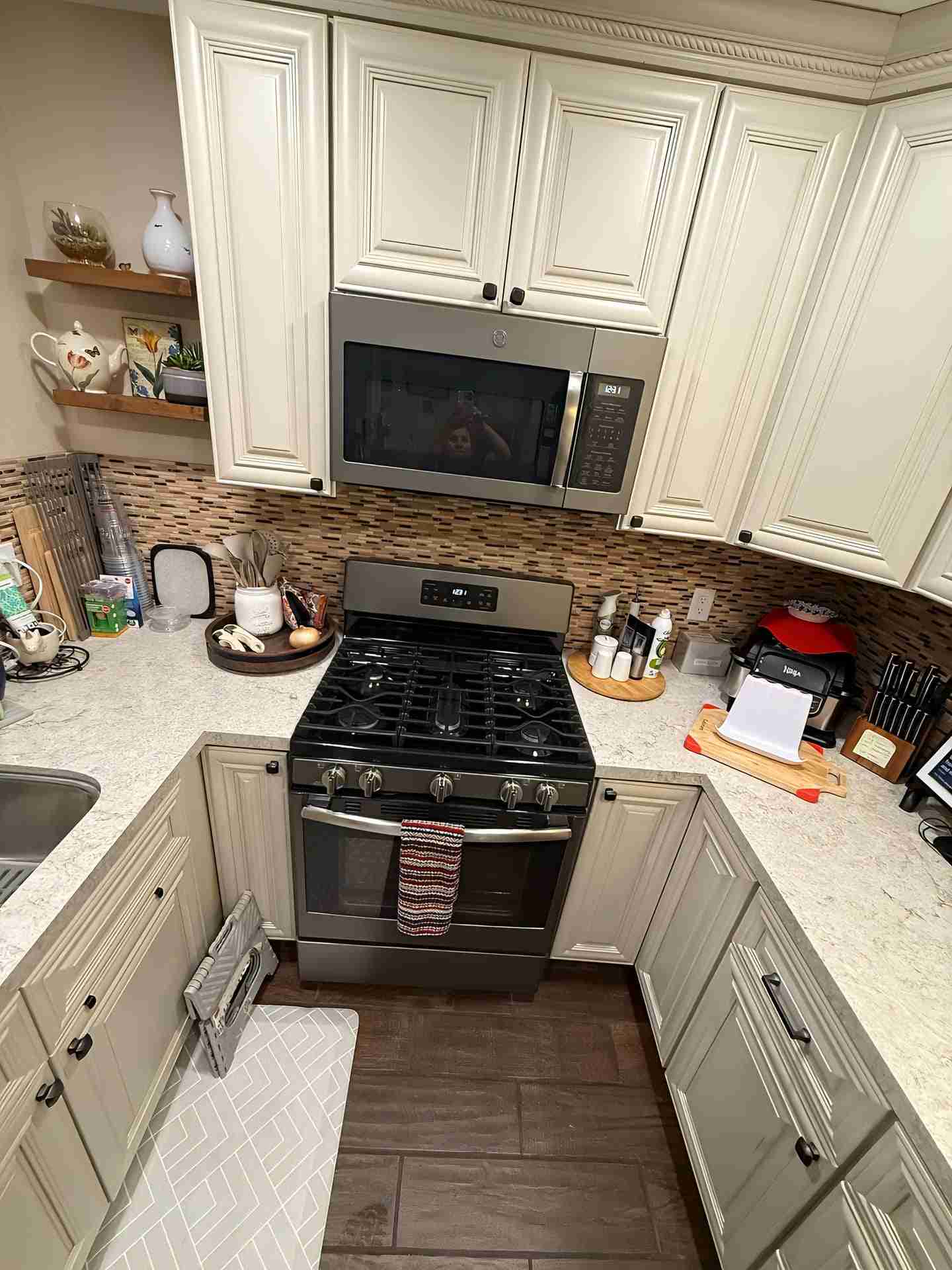 White kitchen after a thorough cleaning by Cleaning Services Masters LLC.