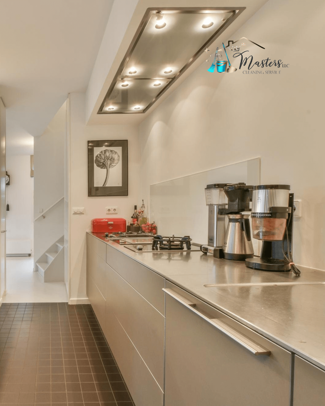 Post-construction cleaned kitchen with shiny countertops and spotless floors